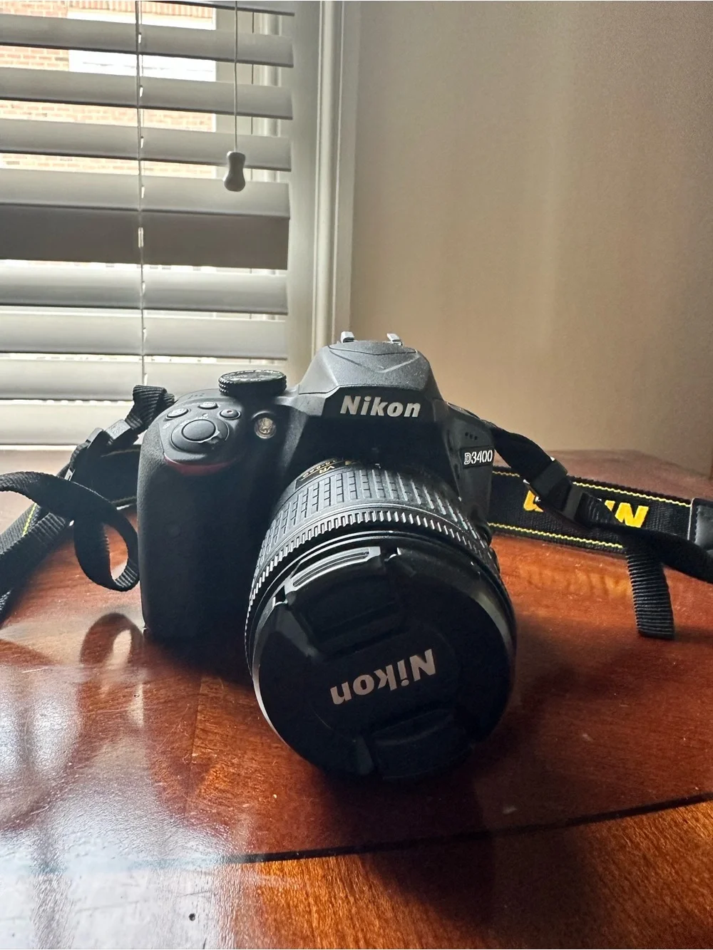 Nikon D3400 DSLR Camera in Black with Black Lens